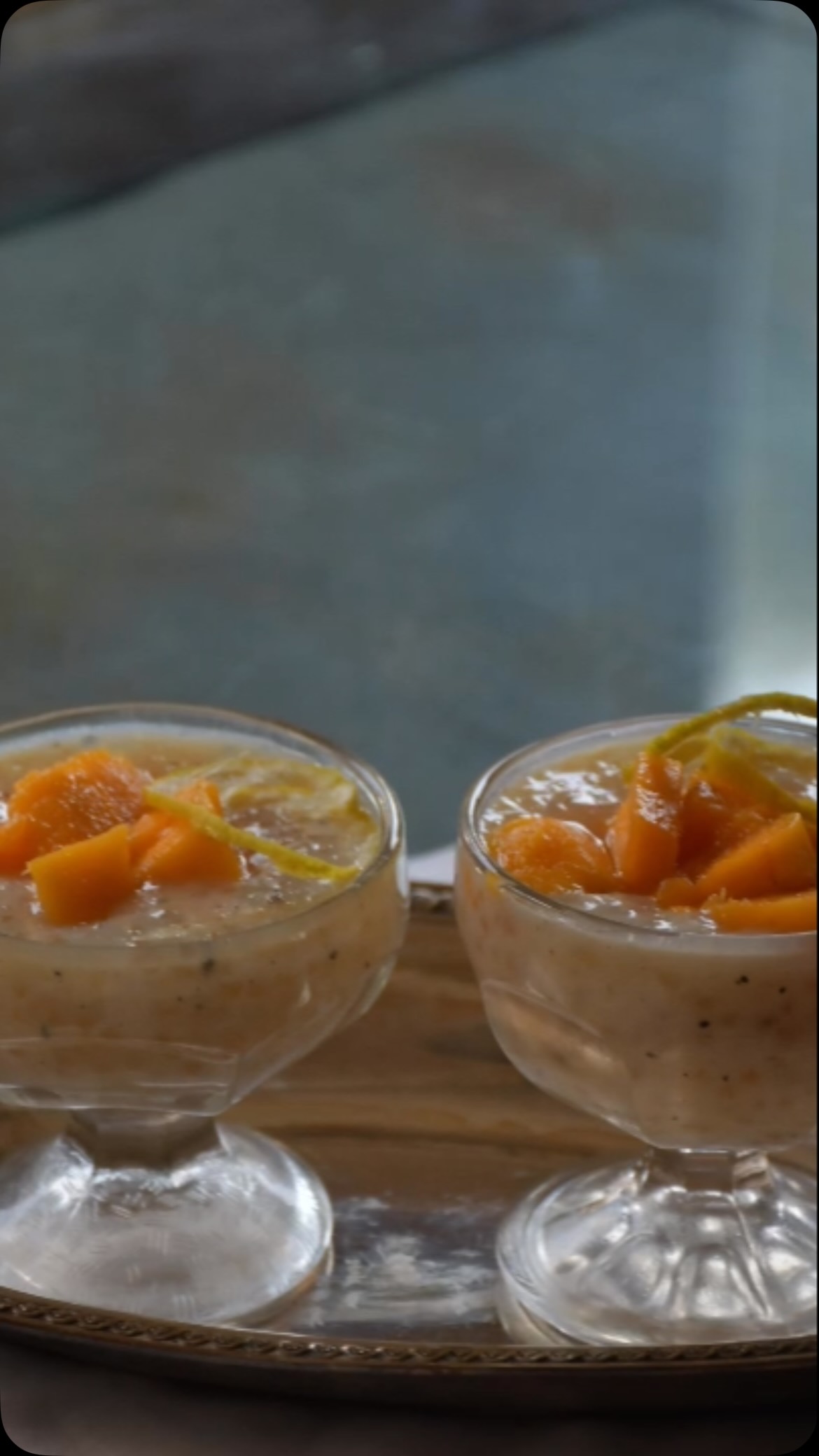#sabudanarecipe #pudding#This pudding is made from small tapioca pearls and coconut milk and served warm. It is much lighter than the Indian-style version. You can adjust the sweetness to your taste. If you are fasting, this is a great recipe!

Ingredients:

Serves: 4 
4 oz or ⅔ cup tapioca (sabudana)
2 cups water 
¼ cup sugar or to taste 
Pinch of salt 
1 cup coconut milk 
1 cup tropical fruits 

For garnish - finely shredded rind of 1 lime

Method

Soak the tapioca in warm water for 1 hour so that the grains drain.
Put the water in a pan and bring to a boil. Stir in the sugar and salt.
Add the coconut milk and tapioca and simmer for 10 minutes or until the tapioca turns transparent.
Serve warm, top with tropical fruits, and decorate with finely shredded lime rind.
Enjoy!
