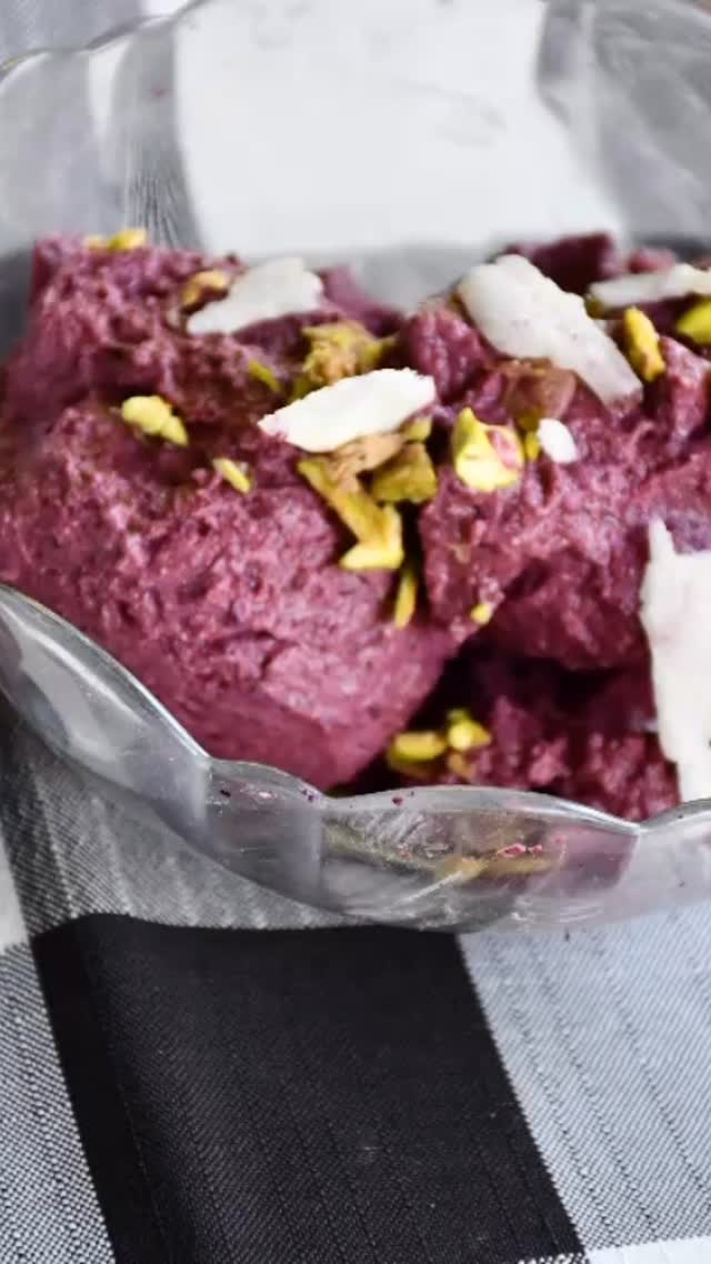 #Bllueberryfrozon#yugart We always need something cold in the summertime, and yogurt is a great choice. Here, I made it in a slightly different way. It’s very tasty and wonderful to serve to others. It’s also easy to make#recipeon👇🏾 

Ingredients
Serves : 4 

¼ cup fresh blueberries
1 orange - grated and juiced
3 tbsp maple syrup
500 grams plain yogurt

Method
Put the blueberries, orange juice, and rinds into a food processor or blender and make a puree.
Strain through a nylon strainer into a bowl.
Mix in an ice-cream maker (if you have one) otherwise hand blend for about 2-4 minutes.
Freeze 5 to 6 hours. If you don’t have an ice-cream maker, transfer the mixture to a freezer proof container, and freeze for about 2 hours.
Remove from the freezer, put into a bowl, and beat until smooth.
Return to the freezer and freeze until firm.
Enjoy!