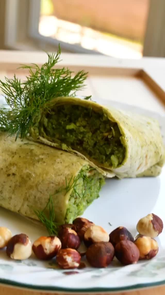#wrap#healty #qunioawraps #yMy favorite part about these wraps is that we can make them the day before - they’re great for work/school, travel, or for a summer picnic! These wraps are delicious, yet easy to make and healthy#pasto 

Ingredients

Serve: 2 

1 cup quinoa
2 cups vegetable stock
Sea salt and black pepper to taste
½ cup hazelnut
1 small garlic clove
½ tbsp lemon zest
¼ cup fresh basil 
½ cup extra virgin olive oil
½ cup dried apricots cut into small pieces
2 spinach wraps or large flour tortillas
Hummus 

Method

Put the quinoa in a mesh strainer and rinse under warm running water for about 3 minutes to remove the bitter outer coating.
Put a small saucepan on high heat, add the quinoa, vegetable stock and salt to taste,  and wait until it boils.
Then, put the heat at medium-low, cover and simmer until most of the stock is absorbed, for about 15 to 20 minutes.  Remove from the heat and let sit, covered, for about 5 minutes or more as required.
Meanwhile, preheat the oven to 275 F.
Spread out the hazelnuts in a single layer on a baking sheet and bake until toasted.
Stir often to keep them from burning, for about 5 to 7 minutes.
Rub the hazel nuts with a paper towel until most of the skins have rubbed off. It should take about 30 seconds or so.
Then, chop the nuts and add the half of them to the food processor, and set aside the remaining half. Add basil, garlic, lemon zest, and olive oil to the food processor and pulse until a thick pesto forms, about 30 seconds, then add salt and pepper.
In a large bowl, combine the cooked quinoa, hazelnuts, pesto, and apricots and toss together.
Then, serve time: if you like hummus, spread on the tortilla first, and then spread the mix onto the tortilla, and serve.
Enjoy!!