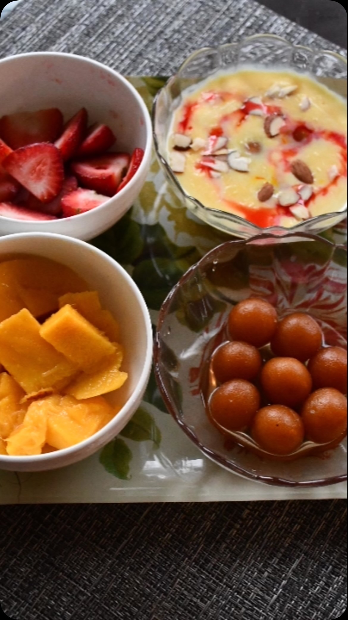 #custerd #recipeideas #I love to eat and serve this cold dessert in the summer time! I am sure everyone will enjoy this colorful, delectable dish!

Ingredients:

Serves: 4 

3 cups whole or 2% milk or whole milk 
2 tbsp custard powder - vanilla or as you like 
Sugar to taste
8 small sized gulab jamuns - room temperature or a little warm if you want a hot/cold taste - cut as you like.
Few drops of roohafza (can be found in Indian stores)
For garnish - pistachio and almond slices
Optional: grapes and pomegranate seeds

Method

Start a heavyweight pan at medium heat.
Add the milk, then take a bowl and add ⅓ cup of water and custard powder. Mix and keep aside.
When the milk is hot, add the custard powder mix, and wait until it boils. 
Check the consistency - we need it to be a little thick. Remember when it’s cold, the custard thickens more.If it’s watery, add more custard powder.
Now, add sugar and stir. 
Then keep inside the fridge for about 3 to 4 hours or more.
Take a serving bowl and add the custard milk and 2 gulab jamuns.
Garnish with pistachios and almonds. If you want grapes and pomegranate, add at this time.
Finally, add a few drops of roohafza.
Enjoy#more recipes on my cookbook, Amazon