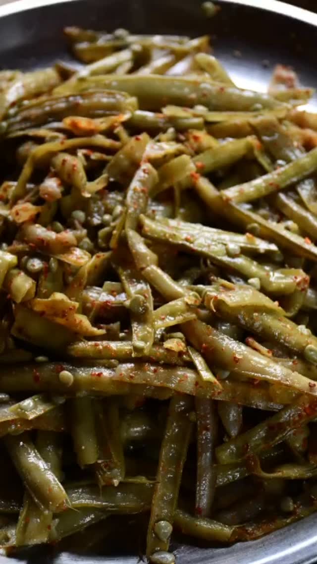 #Guar (Cluster) beans have low carb and high fiber content and are #extremely good for weight reduction and for diabetic patients. It also contains protein and calcium. This curry is not only healthy, but also very simple and easy to make. 

If the beans are not tender, it may take a little bit of work to remove the thread from both sides but the effort is worth the end result#daal#paratha 

Serve with dal (lentil) curry and chapati. 

Ingredients 
Serves 2
1 pound guar (cluster) beans
1 tsp cumin seeds 
2 tsp red chili pepper (or to taste) 
2 tsp coriander powder 
½ tsp turmeric powder 
1 tsp amchoor powder 
2 tsp salt (or to taste)
1 tbsp ghee or butter 
2 tsp ginger garlic paste 
½ tsp hing
Lemon juice (as per taste) - for garnish
Coriander leaves - for garnish 

Method
Wash guar beans and boil in a pressure cooker and wait for one whistle. Leave it in the cooker for pressure to release by itself. Drain water and keep aside for 5 minutes. Alternately boil it in a pan until tender.
Once the beans cool down, pluck the edges and remove the thread from both sides.
Put a pan on medium heat and add ghee/ butter. Once hot, add cumin seeds and hing.
Add ginger-garlic paste and wait for 10 seconds.
Add turmeric and mix. Add guar beans and stir. Add all other dry spices and mix.
Close the lid for about 2 minutes. Turn off the heat and leave it covered for 3 more minutes.
Garnish with chopped cilantro and lemon.

Note: if you want to keep it simple, follow instructions as below
Take guar beans in a bowl and mix salt and red chili powder. Put one hot coal on the top, add ghee, cumin seeds &  hing and close the lid for about 2 minutes. 
Remove the coal and mix all spices one more time and enjoy with chapati, parantha and dal . Makes a perfect meal.

Need more recipes check my cookbook using the link
https://www.amazon.com/Muditas-Kitchen-Delectable-Vegetarian-Recipes/dp/1540735222/ref=sr_1_1?dchild=1&keywords=bhageria&qid=1631499758&sr=8-1