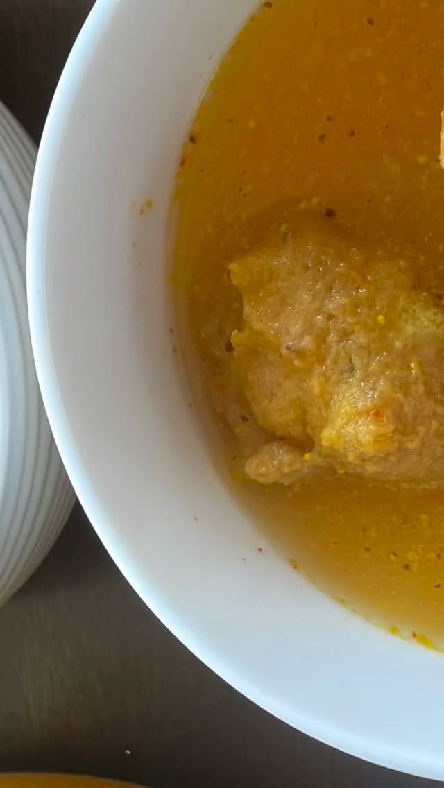 #kanjivada#At the start of spring season, the festival of Holi or sometimes called festival of color  is incomplete without some scrumptious dishes shared with family and friends. Kanji Vada is one such dish that is savored during the festival. It is a spicy drink made with spices such as mustard seeds, asafoetida, red chili etc, served along with vada made from moong dal. It is fermented, sour, tangy and spicy at once, is an excellent probiotic, good for health and can easily be made at home#recipeonmywebsite 

You can also add black carrots and beets to make kanji ki gajar (carrot). 

Makes 25 medium size vadas 

Ingredients 
1.5 cups moong dal (yellow moong lentil)
2 green chilies (or more as per taste) 
1 tsp fennel seeds 
3 tbsp mustard seed powder 
2 tsp red chili powder (or to taste) 
1 tsp hing
⅓ cup besan (chickpea flour) 
1 tsp jeera
2 tbsp whole dhania (Coriander seeds) 
2 tbsp cilantro - finely chopped 
1 inch ginger - chop into grindable pieces
Salt to taste 
Oil for frying, Preferably use mustard oil 

I