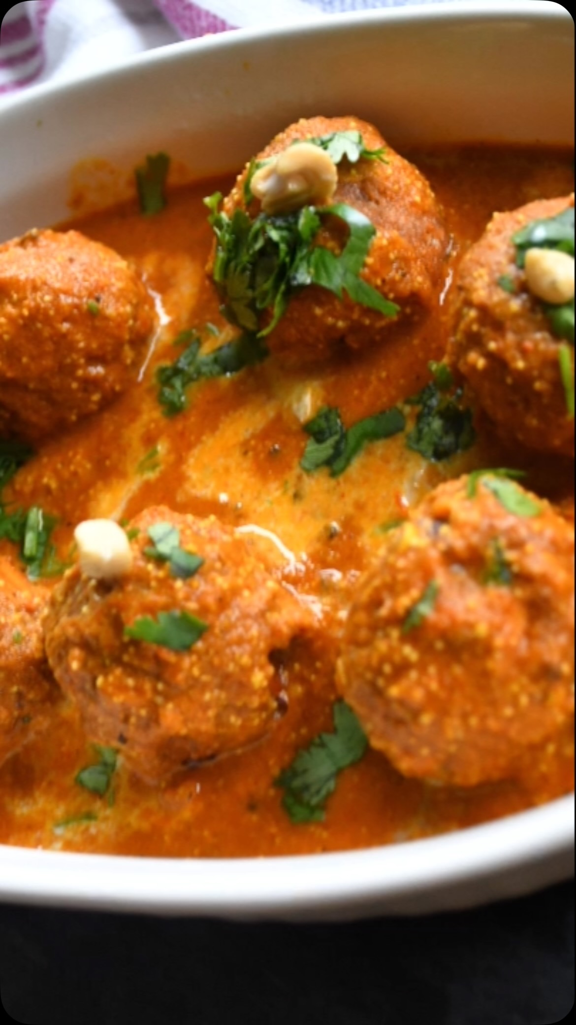 #paneerkoftacurryrecipes #paneerlover #indianfood#koftarecipe #Soft, flavorful paneer koftas stuffed with a delicious carrot, peas, and potato filling, served in a rich and creamy cashew-poppy seed gravy. 😋 Ingredients

Serves 4

For the Koftas

• 1 small carrot, grated
• Cashews, optional
• Raisins, optional
• 1 cup paneer, grated
• ¼ cup peas, steamed and mashed
• 2 green chilies, finely chopped
• 1 tbsp fresh coriander leaves, finely chopped
• 1 large potato, boiled and mashed
• 2 tbsp all-purpose flour or corn flour, plus more if needed
• 1 tsp chaat masala, or to taste
• 1 tsp garam masala, or to taste
• Salt, to taste
• Oil, for frying . full recipe on my website