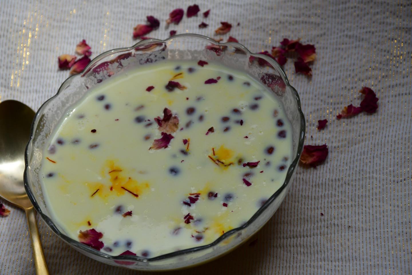 #paneerkheer#kheer#vartfood#super tasty . Try this!
Ingredients
1 cup whole milk
1/2 cup paneer - cut in thin slices
1/4 cup sugar or to taste
1 tsp cornflour
1 tsp cardamom powder
1/2 tsp kewra essence
1/2 tsp chironge
1 tsp golden raisins
Method
Mix cornflour in about 2 tbsp of cold water and keep aside. Put the pan on the stove (at simmer) and pour the milk in the pan. Add the paneer and stir. When the milk is boiling, mix in the cornflower and keep the gas at simmer, because if the gas is at medium or high heat then the milk will burn easily. Mix in the sugar.
Ready to eat! Chill in the fridge for about 2 hours.
Garnish with cardamom, dry red rose flakes, and kewra essence.