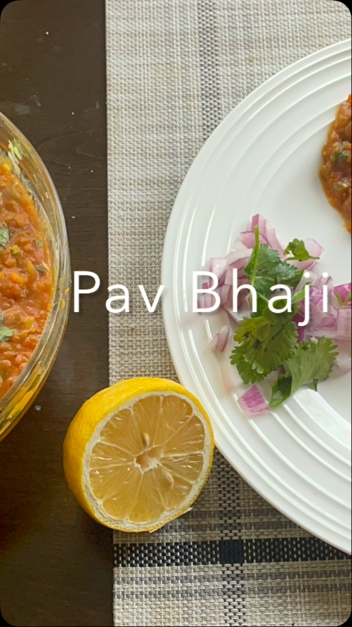 #Pav bhaji is a popular Indian fast food dish that originated in the state of Maharashtra. It is a very popular street food also in Western India but gaining popularity all over India.
For bhaji:
2  medium sized onion- finely chopped
2 large sized tomato- cut small pieces
2 medium sized potatoes - Peeled and cut into small size
2 green chillies -finely chopped (or to taste)
2 tsp ginger - grated
1 large sized green bell pepper- cut in small pieces
3 medium sized carrots - finely chopped
1 beet- grated (adds color to the curry) -optional
½ cup peas
1/2 cup cauliflower - cut to small size
½ cup butter (or ¼ cup oil and ¼ cup butter)
2 tbsp pav bhaji masala (or to taste)
1 tsp cumin seed
1 tsp red chilli powder
2 tsp turmeric powder
2 tbsp coriander powder
salt to taste
For pav:
12 burger buns or dinner rolls or more
butter for buns
For garnish:
2 tbsp fresh coriander leaves
1 lemon
Method
Bhaji (Curry)
Take a pressure cooker (or pan) and add potatoes, peas, beets, cauliflower and carrot with 2 cup water, salt and turmeric powder.
Cook on medium heat and wait for about 15 minutes, or until vegetables are very well cooked.
Take a potato masher and mash the cooked vegetables, and keep aside.
Now take a large size pan and add the butter and/or oil in the pan. Start at medium heat. When the oil starts smoking, add the cumin seeds and wait until it starts to crackle. Add the onions and cook for about 2 minutes.
Add green bell peppers and stir
Add cooked vegetable and stir.
Add little salt as per taste (remember we added salt above while cooking vegetables also).
Mix the curry. Add red chilly powder and coriander powder. If required, add more water and mix
Close the lid and let it cook on low heat for about 10 minutes.
pav bhaji masala and mix
Check the consistency. The curry should be not too watery and not too dry. If it is too dry, add ½ cup water.
Lastly, take a potato masher or a spoon and gently mash the curry. Close the cover on pan for about 5 minutes. The bhaji is now ready.
Garnish with coriander leaves and butter.
Pavs: 
Spread butter on the pav and roast the pav on the griddle. Both sides should be golden brown.
If you like a little spice, sprinkle pav bhaji