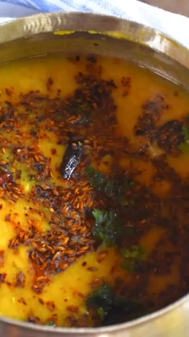 #toordalrecipe #rice#toordaltadka #Toor Dal is very tasty and is popular in the U.P. Always go with rice or roti but dal chawal is very popular in india.

Ingredients
Serves : 2 
1 cup Toor Dal 
2 cups water
½ tsp turmeric powder 
½  tsp coriander powder
1  tsp red chilli powder
2  tsp salt or to taste 
1 tsp cumin seed
Pinch of hing
1 dry whole red chilli
1 tbsp ghee 1 tsp Coriander leaves (for garnish) 
1 small Onion and 1 tomato cut small size and rost on the pan with ghee and add in the daal(optional)

Method:
First, rinse the Daal 3 times, or until the water is clear rather than white.
 Next, take the cooker and pour 2 cups of water in it. After that, pour the dal in the cooker. 
Add the salt and haldi.over the lid, and set the cooker on the gas at medium heat until you hear 3 whistles.Close the cooker and set it on the side until the whistling stops. 
Next, take a frypan and pour the oil in it. When the oil is warm, add the cumin seeds and hing. 
When the cumin seeds start crackling, take the fry pan off the gas and add red chilli and coriander powder with whole red chilli.. Put the mixture into the dal, and your dish is ready! 
Garnish the dal with coriander leaves, and enjoy with rice or naan.