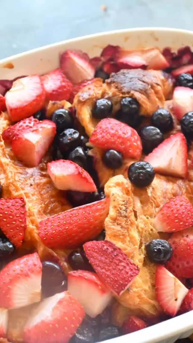 #baked croissant with berries #overnight#breakfast #recipeon👇🏾 #Ingredients 
Serves: 8

8 large croissants or French bread - cut lengthwise or if using French bread cut into small pieces
2 cups whole milk
1 tsp vanilla extract 
6 large eggs
½ cup light brown sugar 
½ tsp ground cinnamon
¼ tsp ground nutmeg
¼ tsp kosher salt 
1 cup strawberries - sliced
1 cup blueberries
For garnish: powdered sugar and maple syrup 

Method 
Take a large baking dish and spread butter on the dish. 
In another bowl mix the eggs, cinnamon, nutmeg, salt, brown sugar, vanilla extract, and milk. 
If using croissants, dip in the milk mixture and put in the baking dish. If using French bread, just put in the dish and spread the milk mixture on the bread. Cover with plastic and keep in the fridge for about 4 to 6 hours, or preferably overnight. 
Take out in the morning and let sit for about 20-25 minutes.
Meanwhile, preheat the oven to 375F. Cover the dish with aluminum foil and bake for 20 minutes. Then, remove the foil and put in the top rack and wait for about 10 minutes or until golden brown.
Take out and let sit for about 10 more minutes, then cut in slices.
For garnish - spread powdered sugar and berries on top, and serve with maple syrup.
Enjoy!