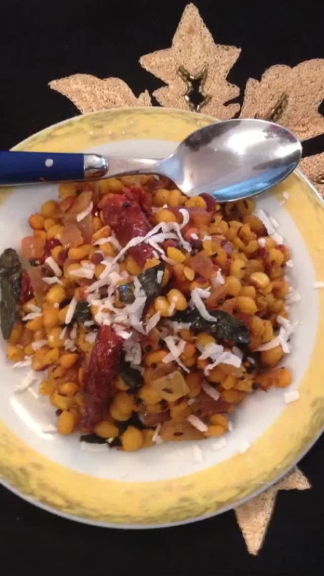 #channa#dal#breakfast #Not all lentils have to be cooked to form a curry. This dish is just lightly spiced and flavored and has no sauce. This is delicious and good with both rice and Indian bread#recipeon👇🏾 
Ingredients
3 tbsp vegetable oil
2/3 tsp cumin seed
1 tsp mustard seeds
1-2 dried red chillies - broken in half
8-10 curry leaves
1/2 onion - finely chopped
1/4 tsp turmeric powder
1/2 cup Bengal gram ( Chana Dal), washed well and soaked overnight
Salt to taste
1 tsp lemon juice
4 tbsp grated fresh coconut or 2 tbsp dry unsweetened coconut
Method
First take a pan and add oil. When the oil is heated, add the mustard seeds, chillies and curry leaves. When the seeds crackle, add the onions. Mix for 2 minutes. After that, add chana dal and stir for 1 minute.  Now, close the lid and wait until the lentils are tender. Add lemon juice, salt, and coconut.
Ready!