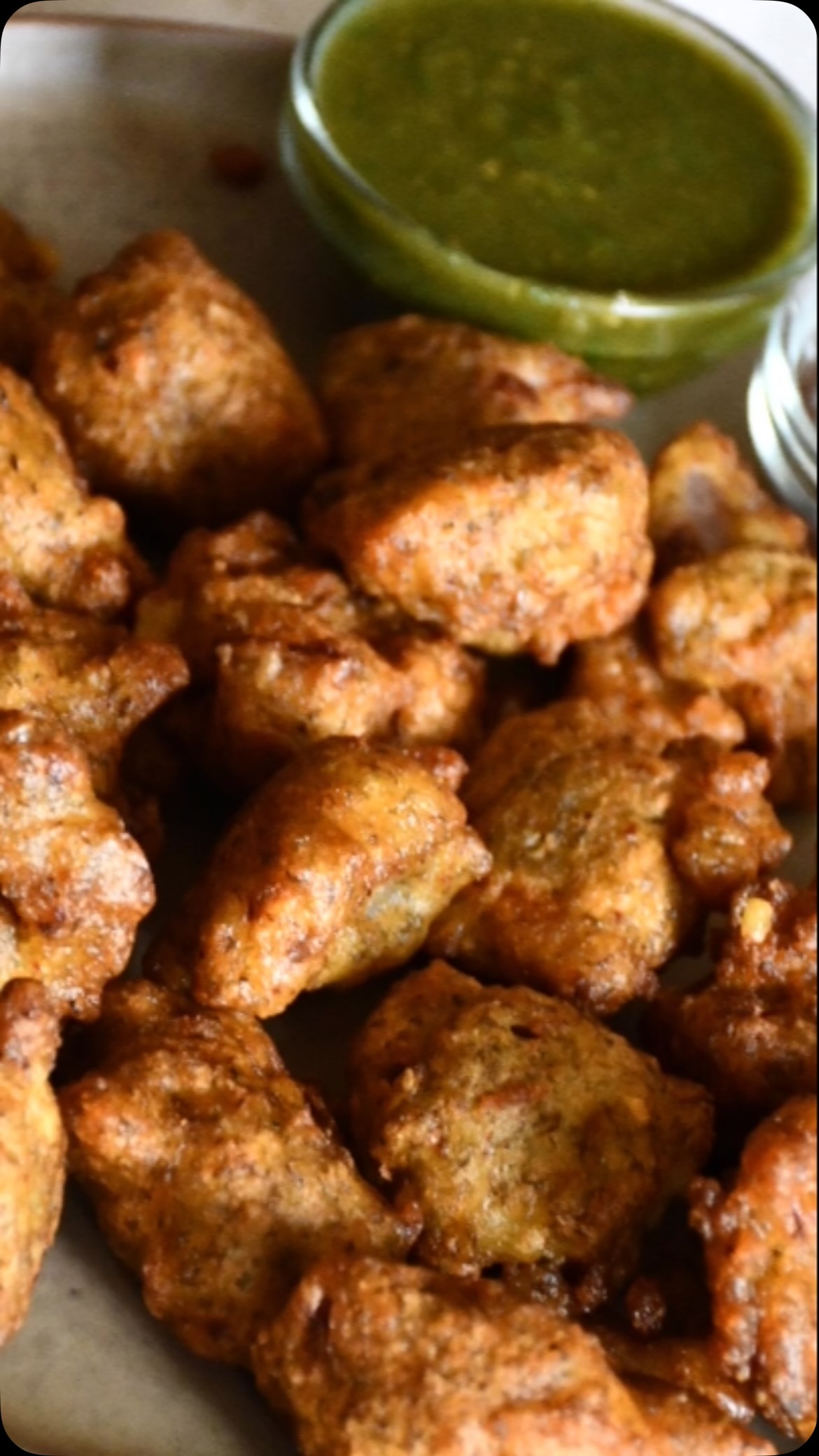 #singhra atta pakora #vart recipe#This is the time navratri starts. And we are making fasting  food. I will making singhara atta pakora add in spice and vegetables like potatoes or spinach. Make a batter and frying in the pakoras#recipeon👇🏾 

2 cup singahra atta flour or buckwheat flour 
2 medium aloo (potatoes), boiled and cut the slice 
2 green chili - finely chopped
2 tsp black salt or to taste
2 tbsp cilantro , finely chopped 
1 tsp black pepper or taste 
Oil for frying 

Green chutney
 1 Cup cilantro , wash and chopped
 ½ cup mint (optional)
1 green chilly or taste 
1 tsp salt or to taste 
1 tsp peanut 
1 tbsp lemon juice 
½ tsp sugar
Method for chutney 
Add all ingredients in the mixer , add 2 tbsp water and grind for about 2 , 3 or more required. Add water more if need. 

method  for pakora 
First take a bowl and add flour, salt, green chilly, cilantro and black pepper. Mix together.
And add slowly water and make a thick batter. Remember singhara atta and buckwheat flour. Do not need much water. Keep on the side for 5 minutes. 
Now,  take a fry pan and put on medium heat, and add oil. Wait until hot. For about 4 to 5 mintues. 
Now take a batter.and mix again , if required add more water take a potatoes one slice and dip in the batter, and put in the oil. 
And do all slices in the same manner. But do the crowd on oil .Otherwise pakoras not fry very well.
Fry on medium heat until golden brown. 
Ready , enjoy with dhai , tea and green chutney. 

If you’re like spinach add in the better with spice and make a pakoras.