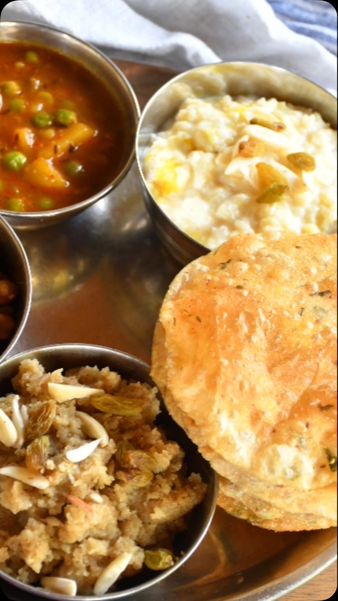 #Happy Ashtami 🌹🙏 Kala channa recipe #maaduraga🌺🙏 #This is a very high protein and delicious dish! We always offer it in Durga puja (a Hindu holiday), because we believe Durga Ji loves it. This is easy to make, and a great snack or lunch. This recipe is also oil free, sugar-free, vegan and gluten free. In India we used to eat it quite often, and some people also add potatoes, tomatoes, and spices to make a thick curry and serve with rice.

Ingredients 
Serves: 2 or more 
For puja or dry chana 
1 cup kala chana - soak for 5 to 6 hours 
2 green chili - finely chopped (optional)
2 tsp salt or to taste 
1 tsp cumin seeds 
1 tsp garam masala 
1 tej patta (bay leaf)
⅓ tsp hing 
1 tsp ginger - finely chopped 
Cilantro - finely chopped (optional)

Kala Chana Salad 
1 medium size tomato - finely chopped 
1 small size onion - finely chopped 
2 tbsp cilantro - finely chopped 
1 tsp mint - chopped (optional)
1 tsp kala salt (black salt)
1 tsp chaat masala
2 tbsp lemon juice 

Method
First, boil the chanas with salt in a pressure cooker for about 10 to 15 minute minutes.
Rest for about 10 minutes (don’t drain the water yet). Keep aside.

Dry Channa
If making for puja, add oil in a fry pan and add cumin seed, bay leaf and hing. Wait until the seeds crackle.
Add chanas (keep about ½ cup water and drain the rest), salt, and garam masala. Stir.
Cover for about 5 to 8 minutes. 
Garnish with ginger, cilantro and green chili.
Enjoy!

Salad
Drain the chanas and mix them well with tomato, green chilli, onion, lemon juice and chaat masala.
Garnish with cilantro and mint.
Enjoy!